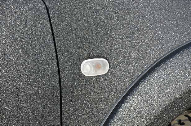 Полная защита кузова внедорожника Mitsubishi Pajero Sport полимерным покрытием Line-X.