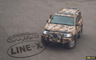 Защита кузова автомобиля Toyota Land Cruiser полимерным покрытием Line-X, аэрография