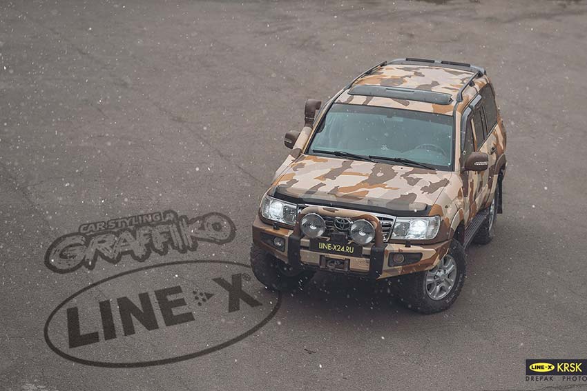 Защита кузова автомобиля Toyota Land Cruiser полимерным покрытием Line-X, аэрография