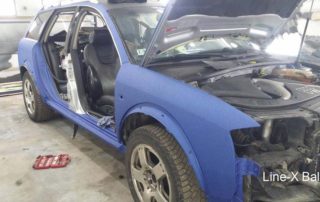 Защита автомобиля Audi A6 Allroad Quattro полимерным покрытием Line-X