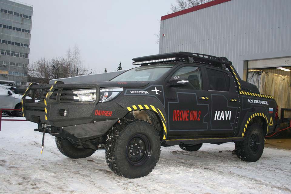 Защита кузова автомобиля полимерным покрытием Line-X, трафаретная аэрография