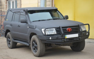 Защита кузова Toyota Land Cruiser 100 полимерным покрытием Line-X