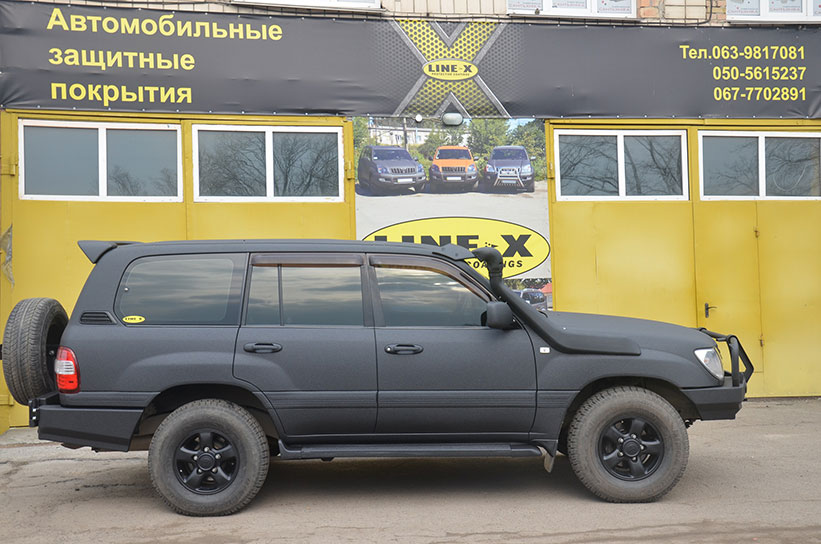 Защита кузова Toyota Land Cruiser 100 полимерным покрытием Line-X