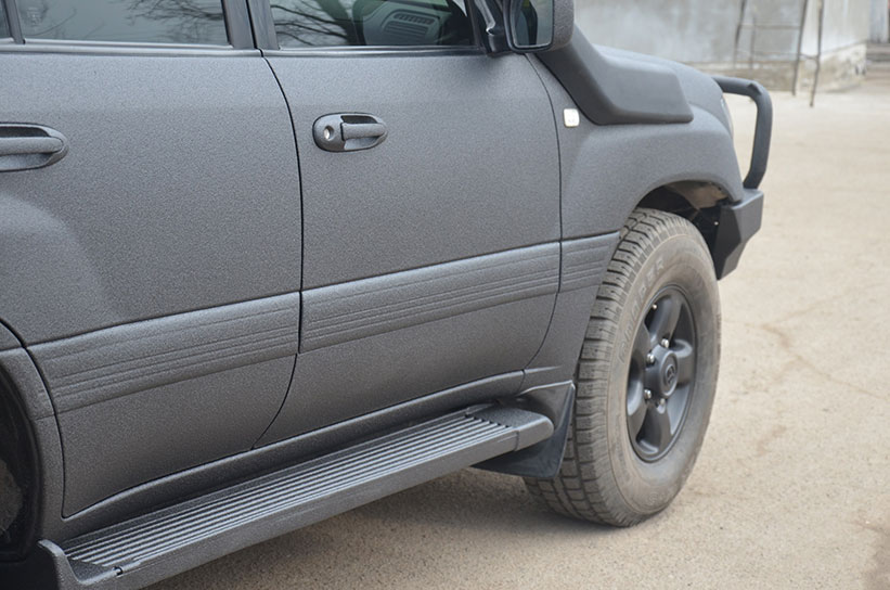 Защита кузова Toyota Land Cruiser 100 полимерным покрытием Line-X