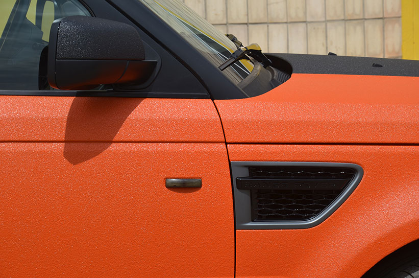 Эксклюзивная защита кузова внедорожника премиум класса Range Rover Sport полимерным покрытием Line-X