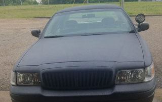 Защита кузова полноразмерного седана Ford Crown Victoria полимерным покрытием Line-X.