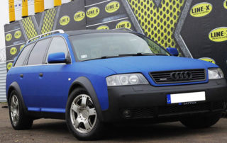 Защита кузова полноприводного универсала Audi Allroad от механических повреждений и коррозии полимерным покрытием Line-X