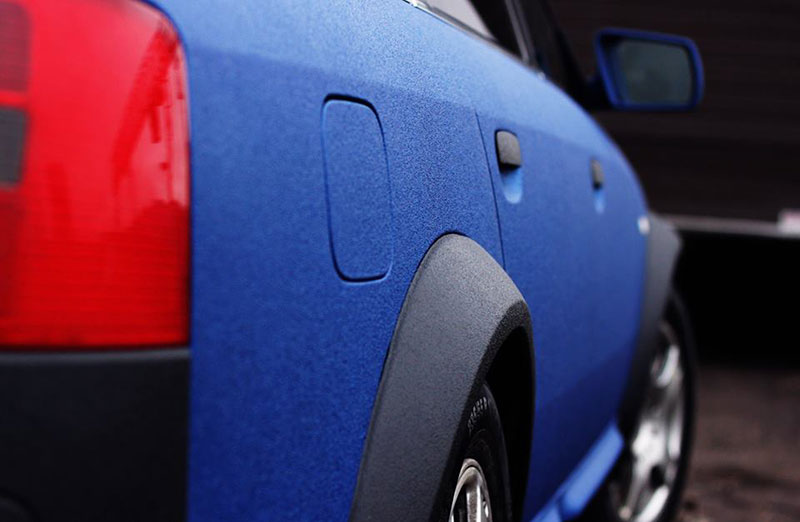 Защита кузова полноприводного универсала Audi Allroad от механических повреждений и коррозии полимерным покрытием Line-X