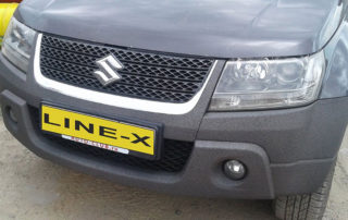 Защита бампера внедорожника Suzuki Grand Vitara от механических повреждений полимерным покрытием Line-X