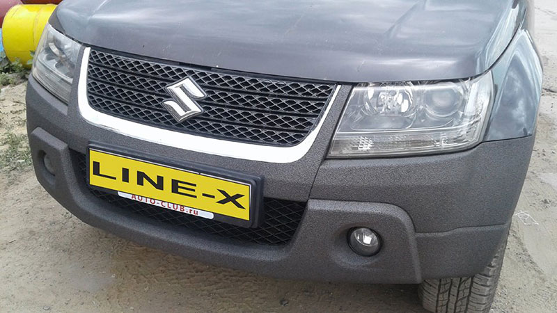 Защита бампера внедорожника Suzuki Grand Vitara от механических повреждений полимерным покрытием Line-X