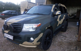 Защита автомобиля Toyota Land Cruiser от механических повреждений и коррозии полимерным покрытием Line-X, аэрография