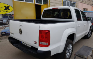 Защита кузова пикапа Volkswagen Amarok от механических повреждений и коррозии полимерным покрытием Line-X