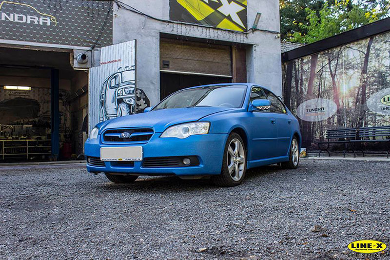 Защита полноприводного седана Subaru Legacy от механических повреждений и коррозии полимерным покрытием Line-X.