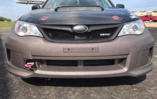 Комбинированная окраска в два цвета автомобиля Subaru Impreza WRX защитным полимерным покрытием Line-X.