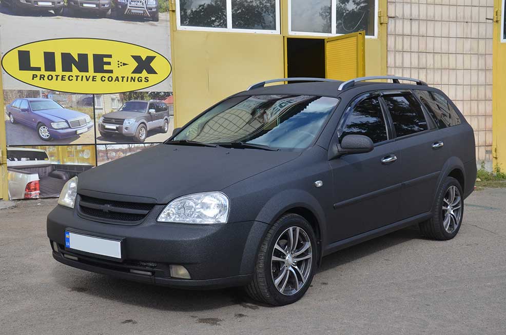 Защита кузова универсала Chevrolet Lacetti от механических повреждений и коррозии полимерным покрытием Line-X в тюнинг-ателье «Гранд Протект». Украина. Киев.