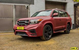 Защита кузова внедорожника Toyota Land Cruiser 200 от механических повреждений и коррозии полимерным покрытием Line-X.