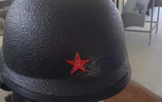 Усиление защитных свойств мотошлема путем нанесения полимерного покрытия Line-X