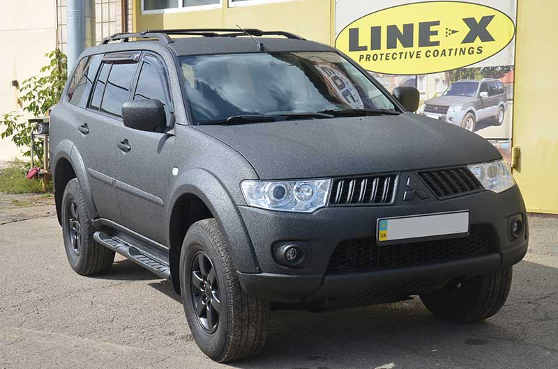 Работа компании «Армлайн»: защита кузова внедорожника Mitsubishi Pajero Sport полимерным покрытием Line-X от механических повреждений и коррозии.