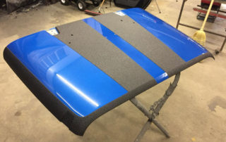 Графические оформление капота автомобиля полимерным покрытием Line-X