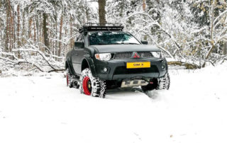 Защита кузова пикапа Mitsubishi L200 Line-X полимерным покрытием Line-x от механических повреждений и ржавчины, аэрография