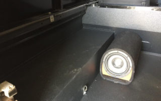 Защита кузова и сабвуфера пикапа полимерным покрытием Line-X от ударов и царапин. Звукоизоляция