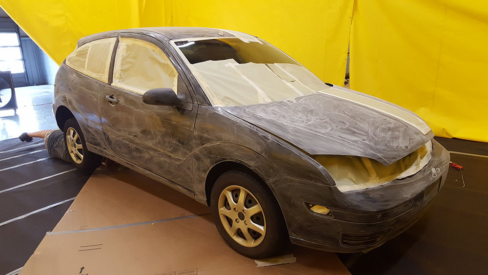 Защита кузова автомобиля Ford Focus полимерным покрытием Line X от ударов, царапин и коррозии