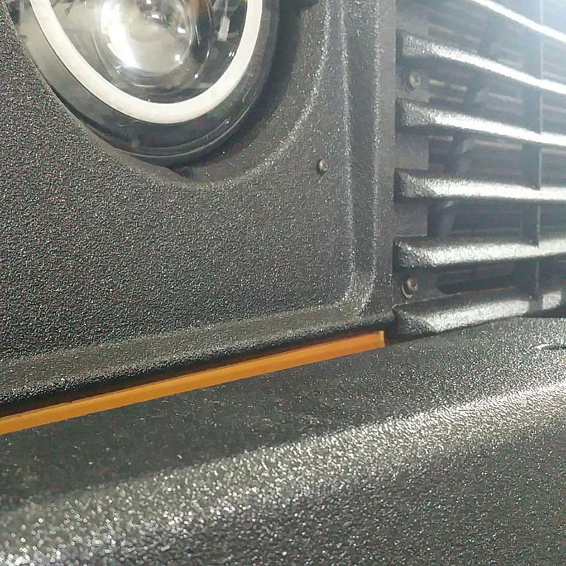 Защитное покрытие Line-X на элементах кузова и багажника пикапов Land Rover Defender