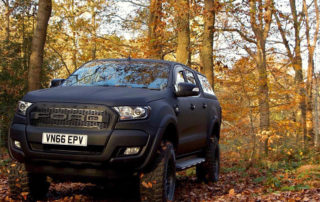 Защита кузова и карт дверей внедорожника Ford Ranger полимерным покрытием Line-X