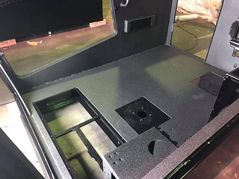 Защита кабины экскаватора Cat 6020B покрытием Line-X