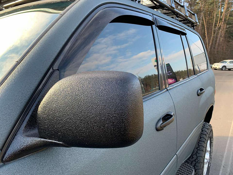 Тюнинг Toyota Land Cruiser 100 и защита кузова покрытием Line-X