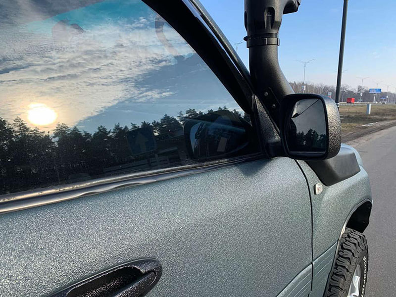 Тюнинг Toyota Land Cruiser 100 и защита кузова покрытием Line-X