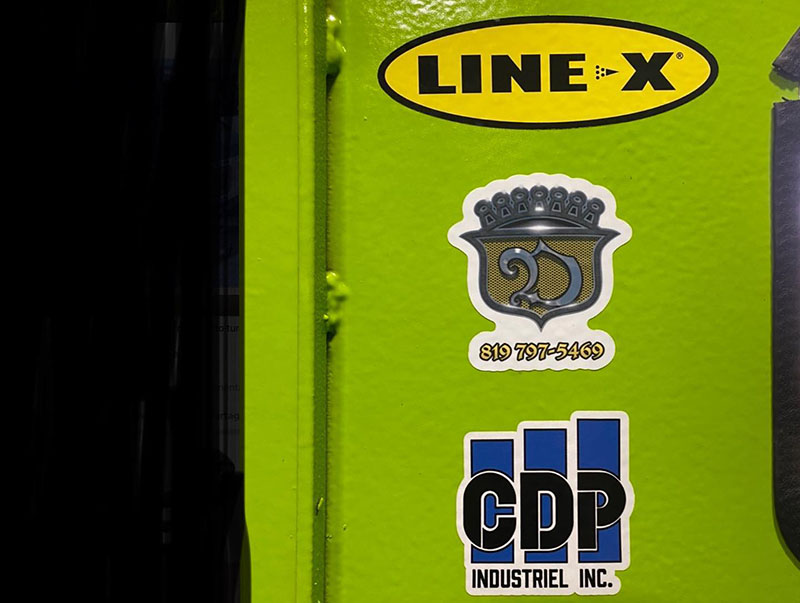 Защита кузова мусоровоза от механических повреждений покрытием Line-X