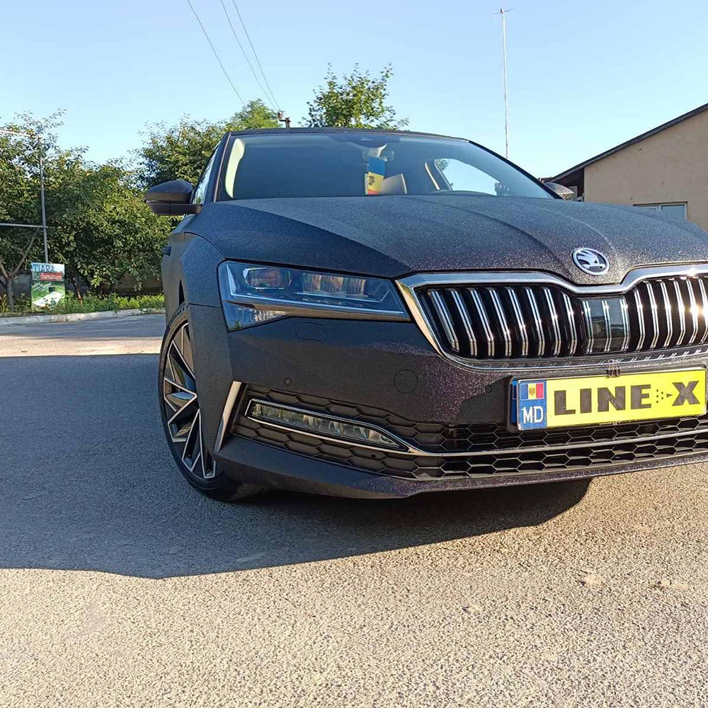 Защита кузова седана SKODA Octavia полимерным покрытием Line-X