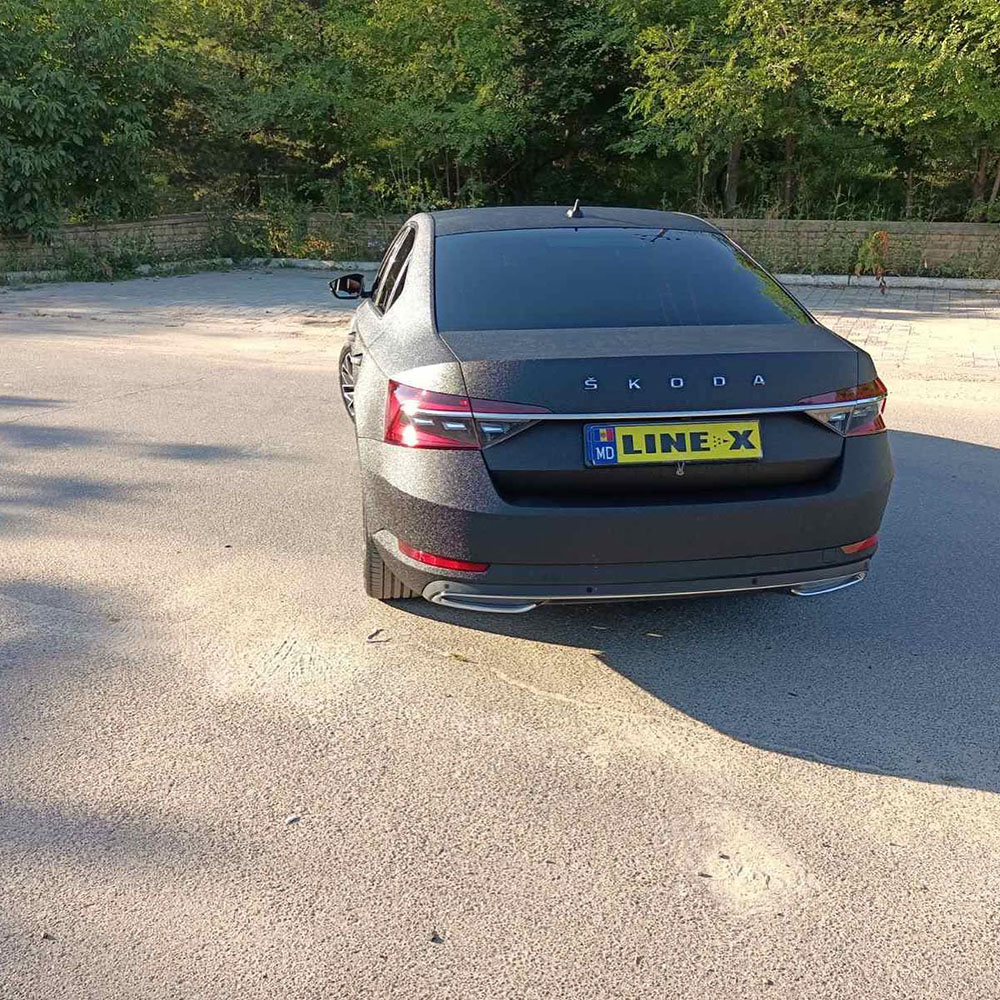 Защита кузова седана SKODA Octavia полимерным покрытием Line-X