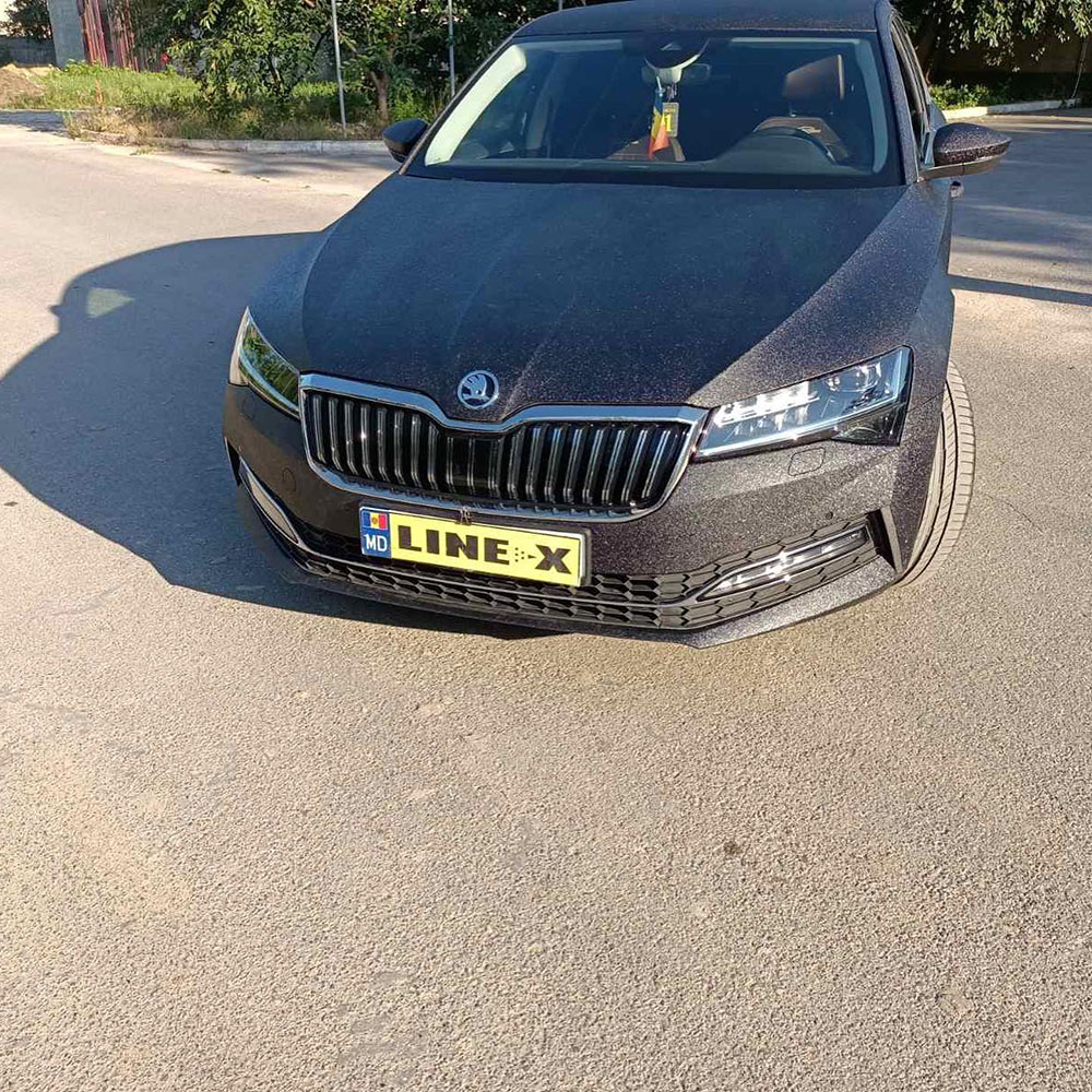 Защита кузова седана SKODA Octavia полимерным покрытием Line-X