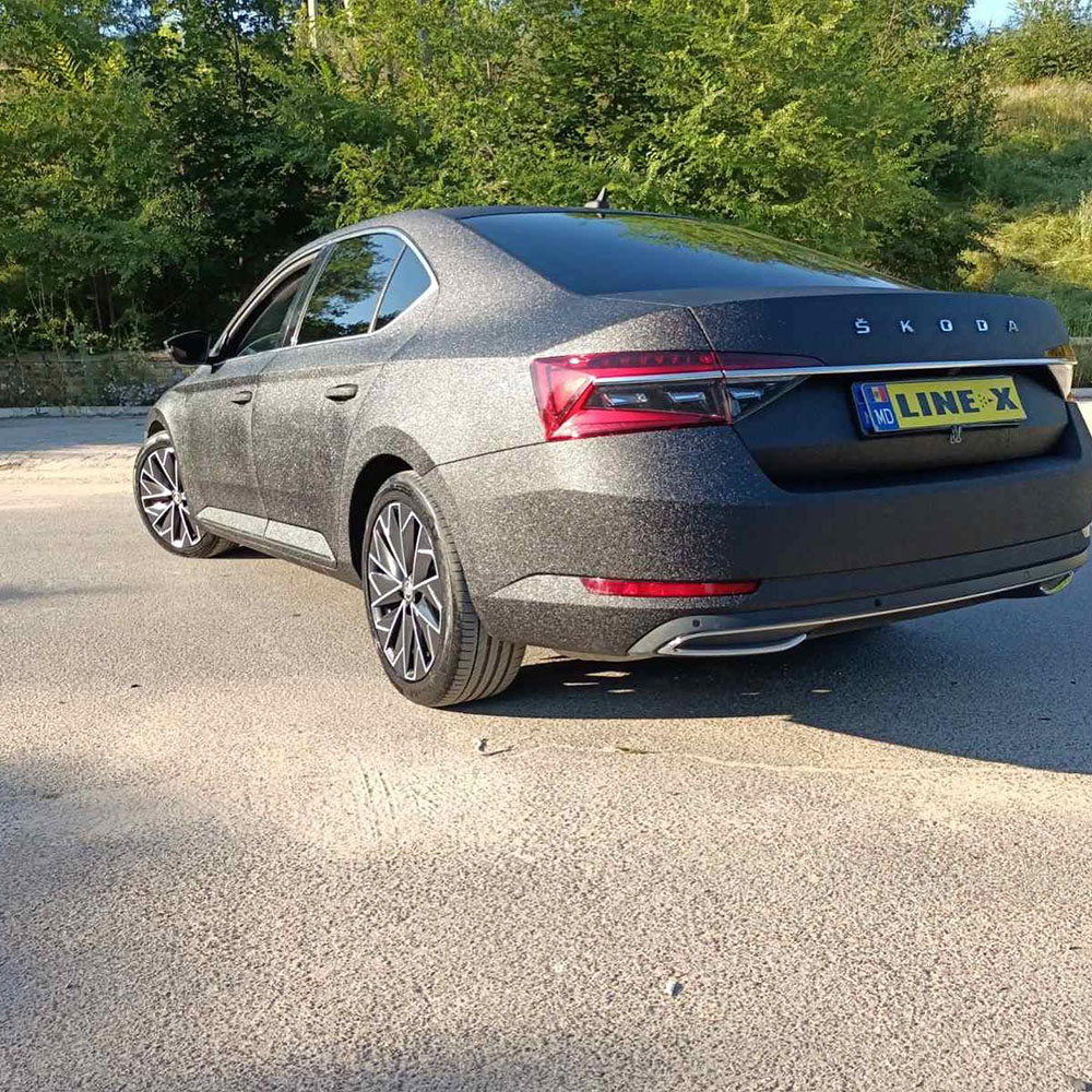 Защита кузова седана SKODA Octavia полимерным покрытием Line-X