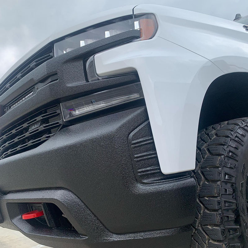 Защита бампера и решетки радиатора полимерным покрытием Line-X